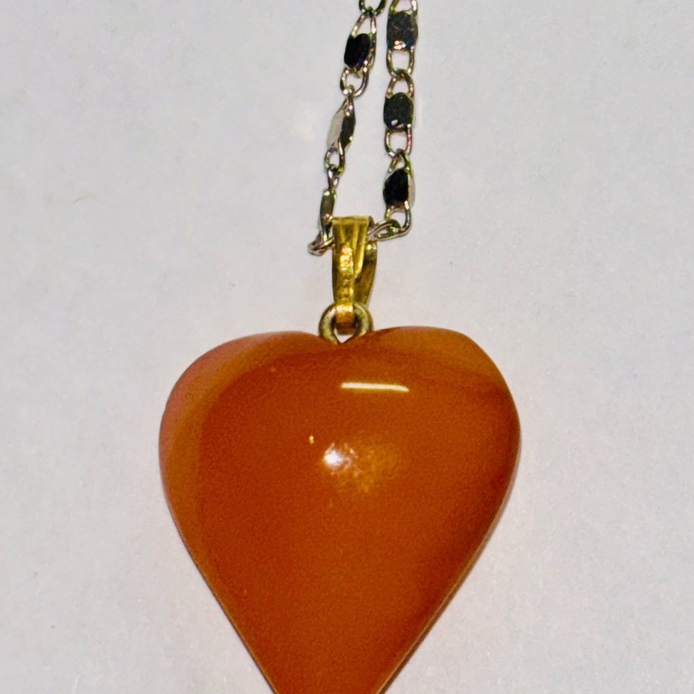 Amber stone Heart Pendant on a silver Necklace